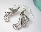 Antiqued silver earrings with peacock tail flourish on sterling silver ear wires.