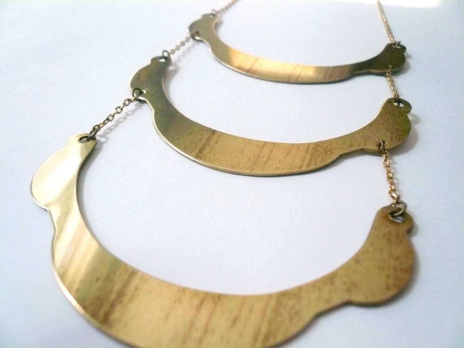 Gold geometric necklace. with triple arcs. Long brass necklace. Geometric jewelry. Third times a charm.