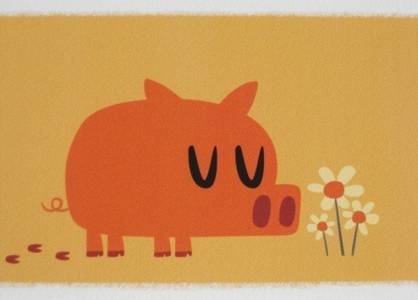 Pig smelling flowers