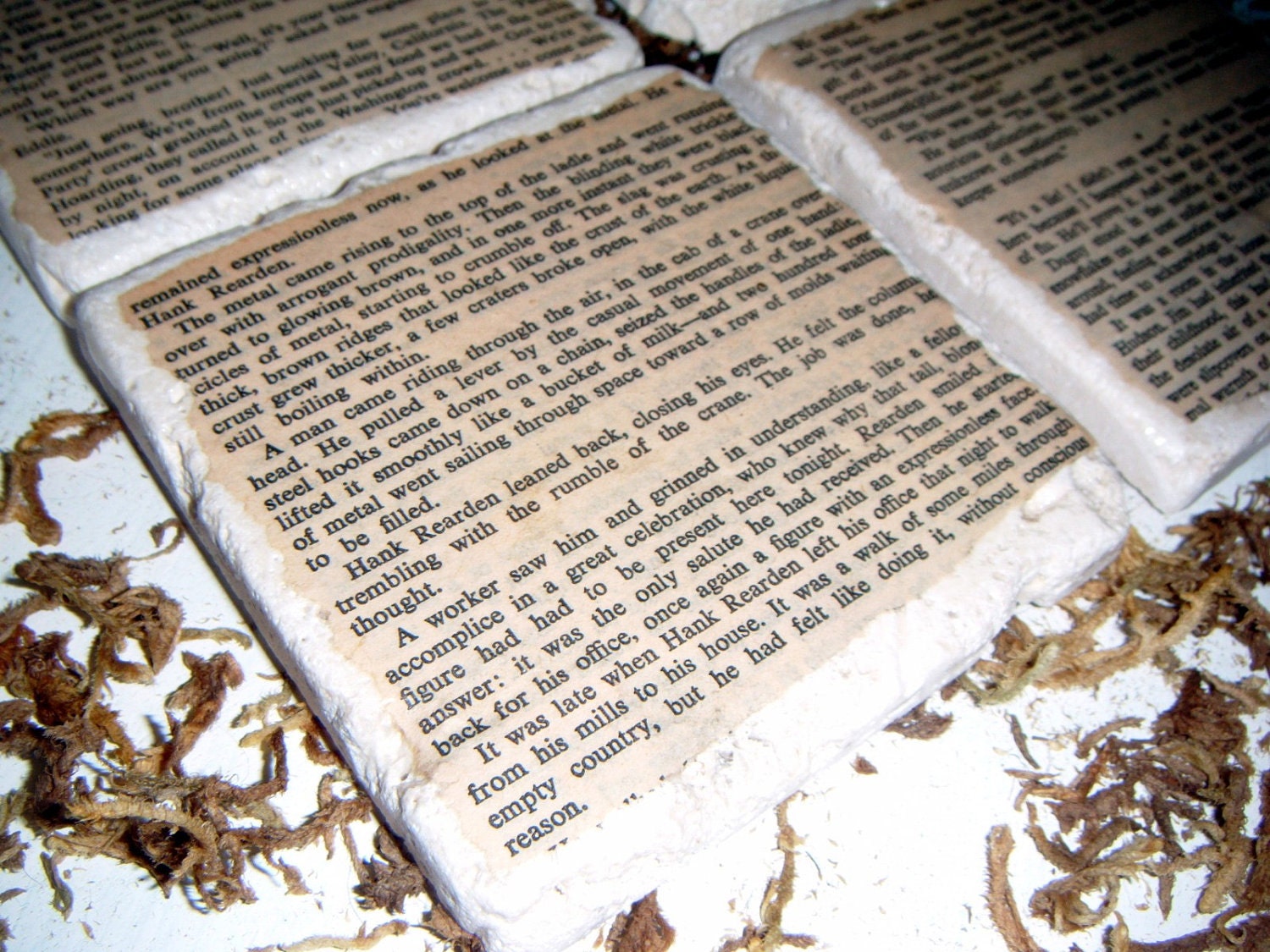 Coaster Set, ATLAS SHRUGGED by Ayn Rand-Unique tumbled stone coasters made from actual book pages-Fun to read snippets of story