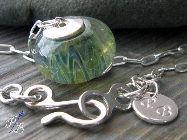 Glass boro lampwork sterling silver necklace. Green & blue wave design. Quality chain, handcrafted clasp. Artisan handmade Turtle Talk.