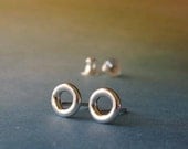 Shiny minimalist sterling silver donut stud earrings. Modern simple post rings. Tiny everyday jewelry. Circles. Artisan handmade gift.