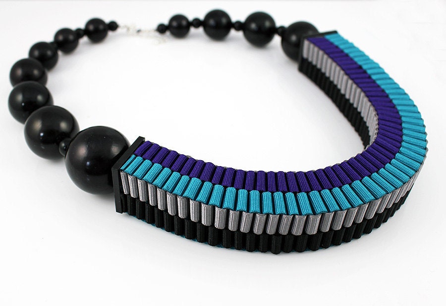 The Celeste asymmetrical woven beaded necklace in purple / sapphire blue