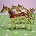 Three Miniature Gold Horses