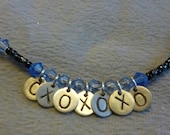 Violets Are Blue hugs and kisses crystal and chain necklace