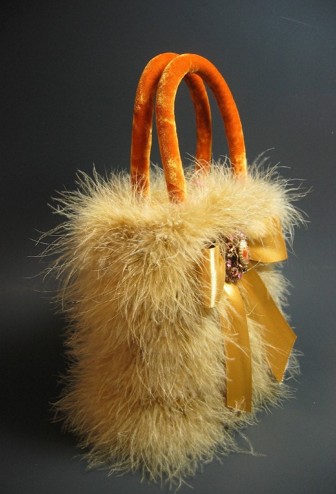 AMBER GOLD VELVET EVENING BAG DECORATED with GOLDEN MARABOU FEATHERS, SATIN BOW and VINTAGE BROOCH