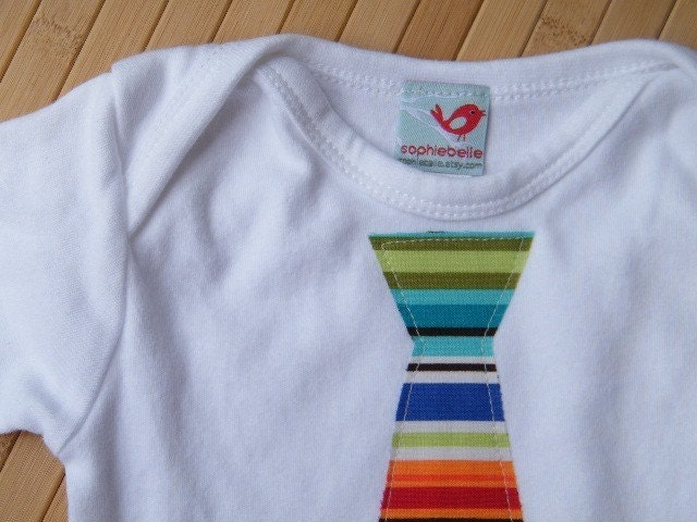 organic onesie with crazy stripes tie applique