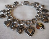 On Sale Circa 1920 Sterling Silver Heart Charm Bracelet