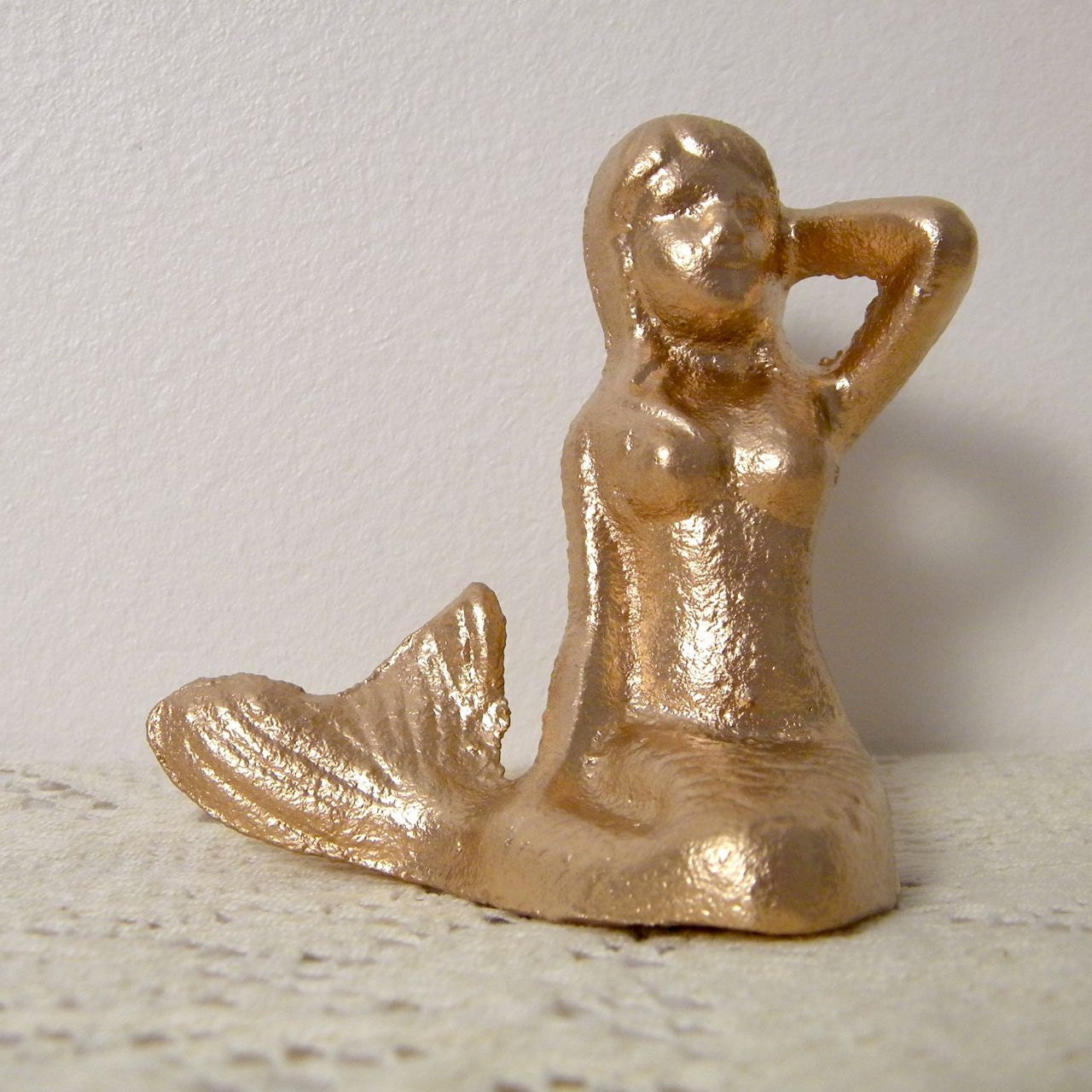golden mermaid paperweight