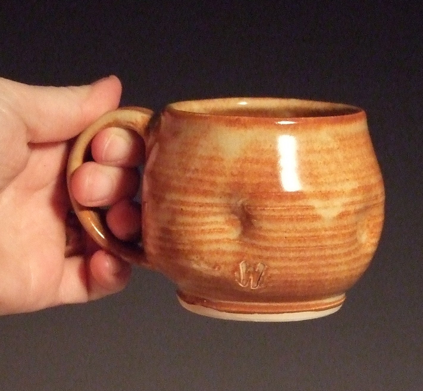Shino Wheel Thrown Mug - thrown and altered with dimples