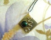 Sterling Silver pendant with hand bezeled Malachite cabachon