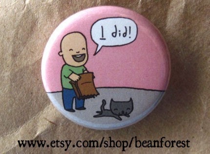the cat is out of the bag and i did it - pinback button badge