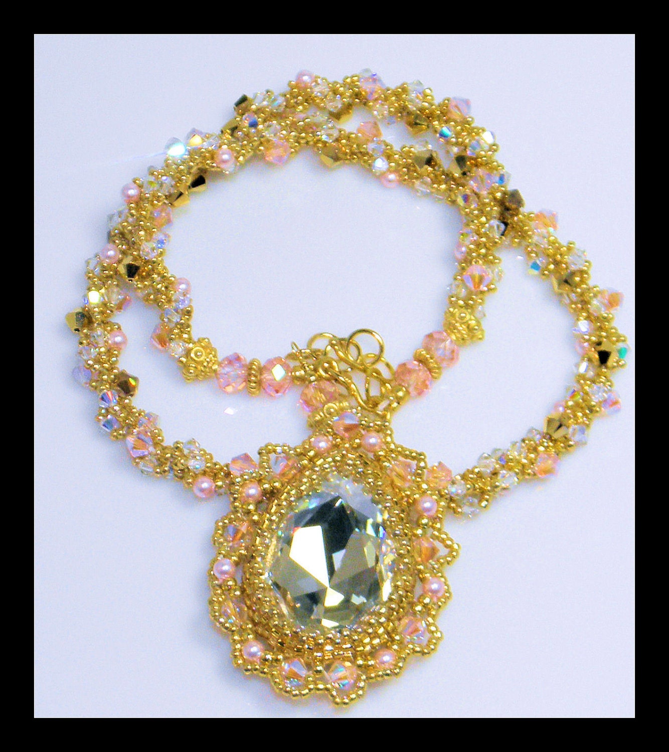 Angelic-Necklace with Swarovski crystal stone, bicones, pearls 22kt gold seed beads and 22kt Vermeil gold