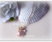 Ocean Pink Necklace made with pink seashell, star quartz, swarovski crystals, star like charm etc.