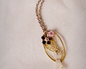Pet Cat necklace made with mother of pearl cat, flowers, leave charm, swarovski crystal etc.