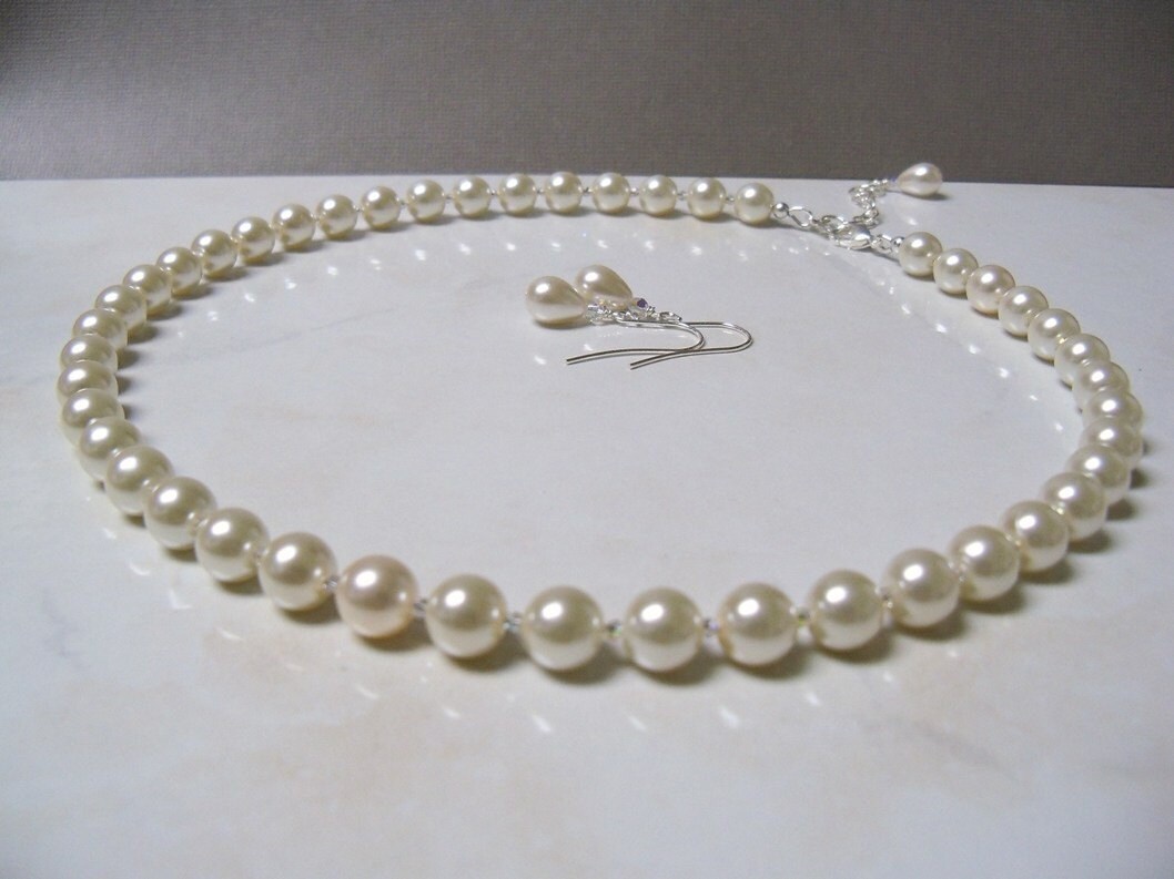 Swarovski crystal and ivory pearl necklace, bracelet and earrings set adjustable length 3 piece set