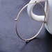 Modern silver bangle bracelet formed and forged of thick silver wire and accented with argentium balls - "Compass Bangle"