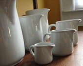 Gorgeous set of 6 Arabia Finland graduated pitchers. Kaj Franck