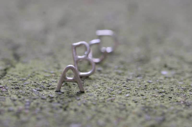 Alphabet letter stud earrings in Sterling Silver