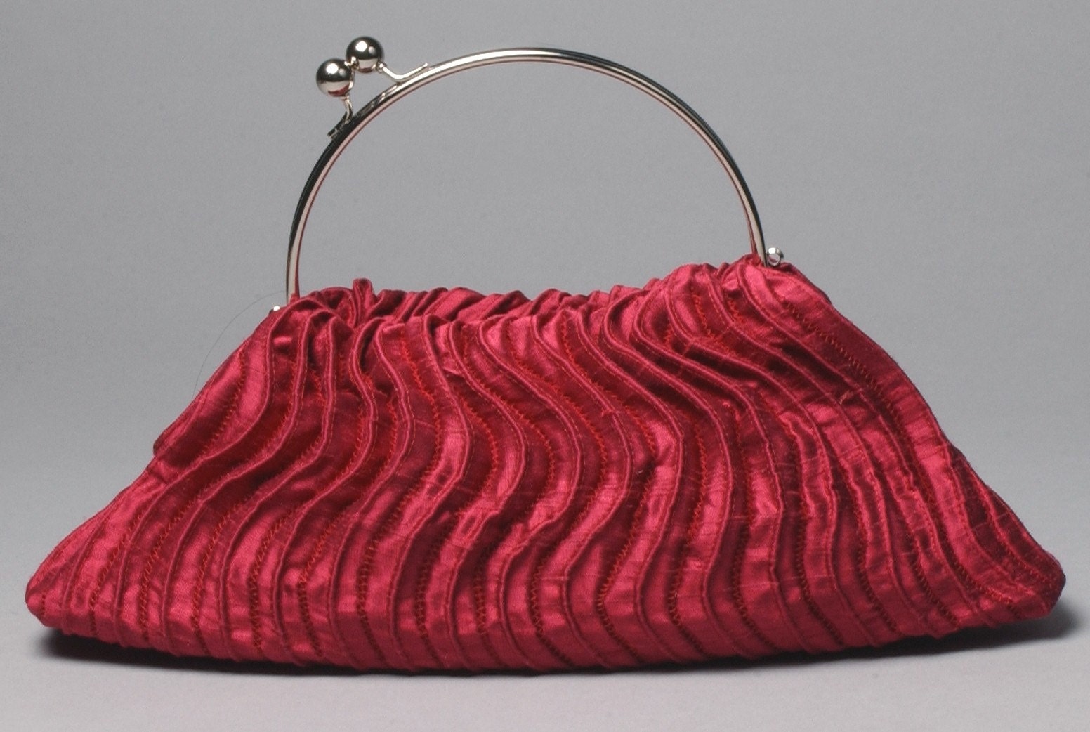 Items similar to damson red silk purse bag in sculpted pleated fabric