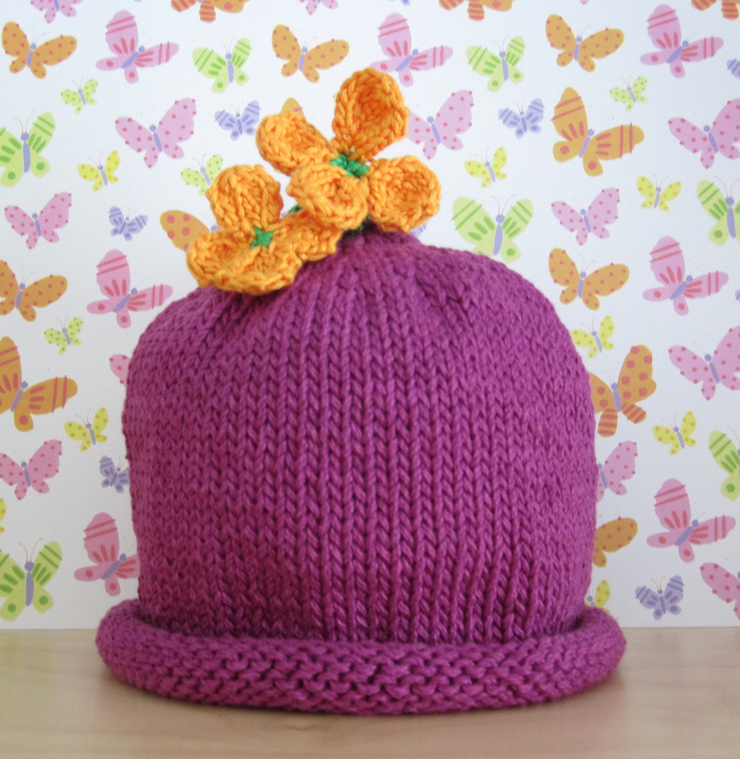 Bright Blooms hand knit baby hat