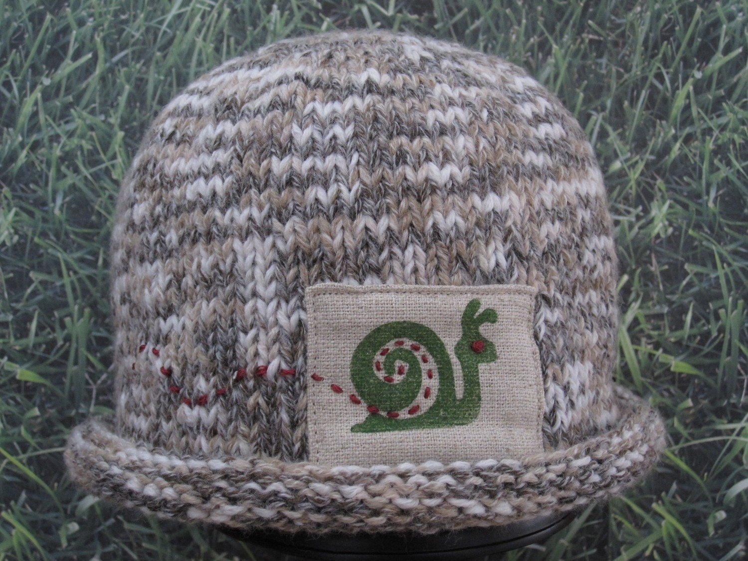 Snail Trail hand knit baby hat
