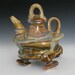 funky footed loopy handle teapot