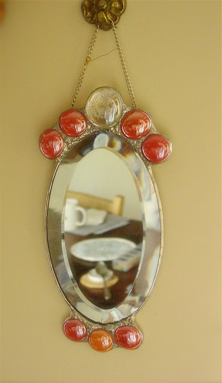 Oval mirror.
