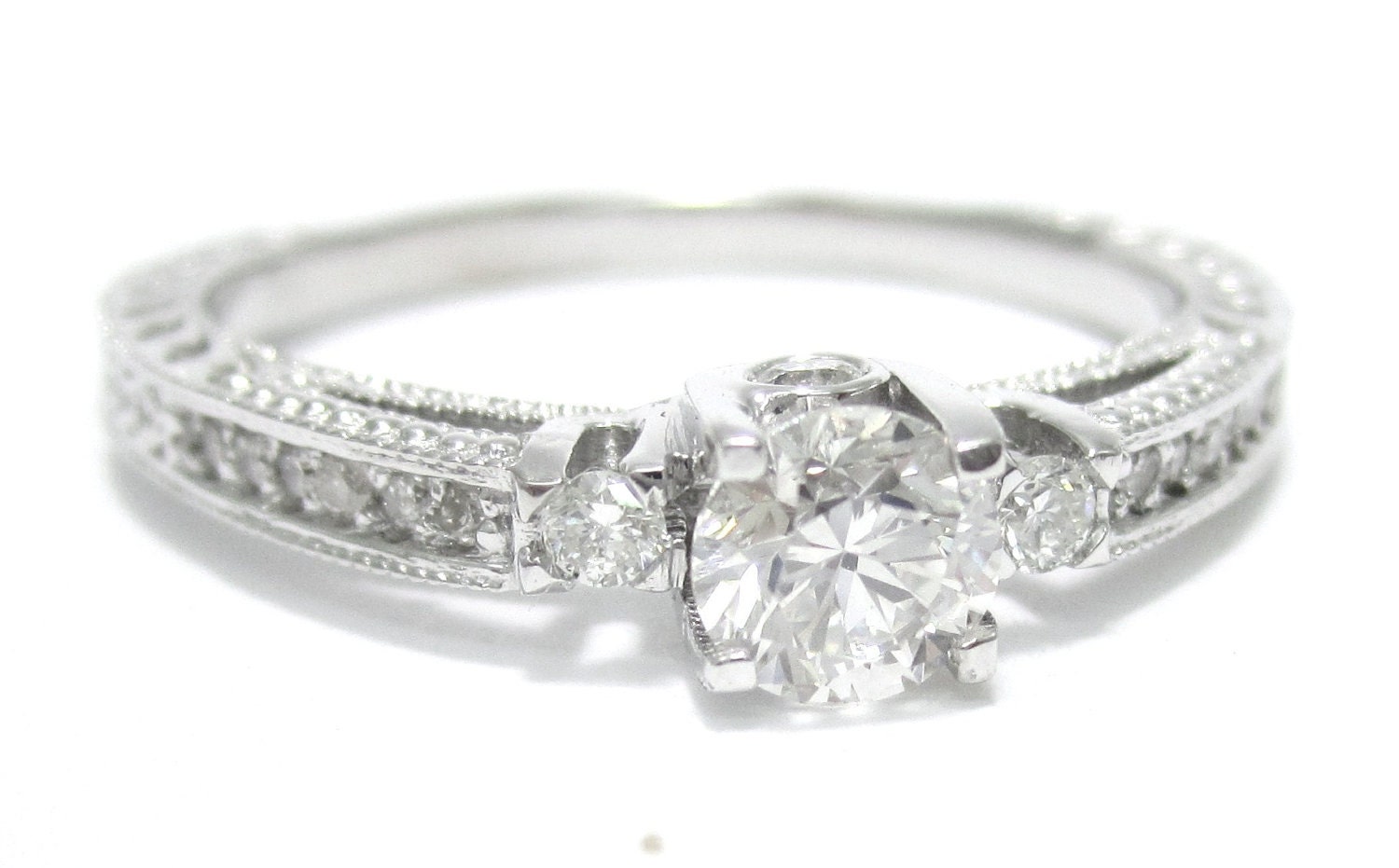 Round cut prong set antique style diamond engagement ring R160