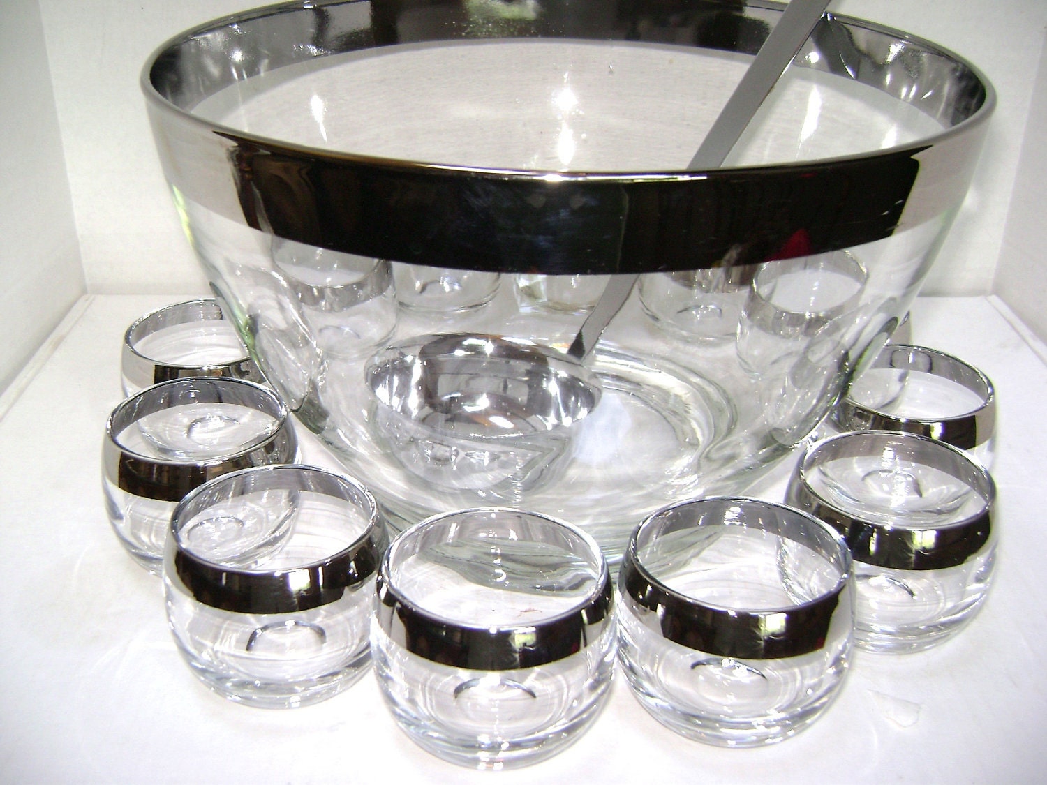 HOLDING FOR PATRICK 14 Piece, Silver Rimmed Punch Bowl, Ladle, Roly Poly Glasses, Mid Century Mad Men Bar Ware