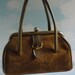 VTG Military green leather handbag.