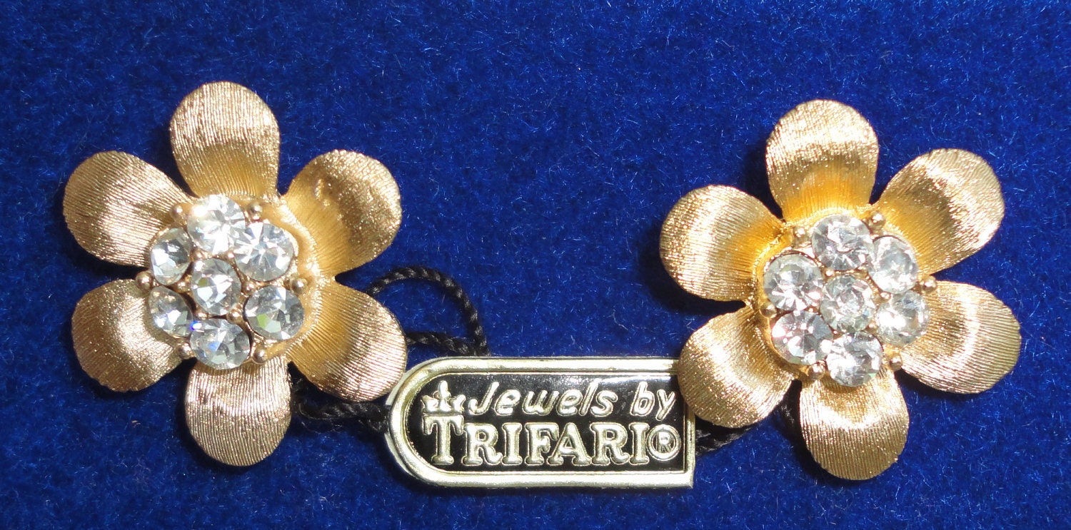 Jewels by Trifari. Crown Trifari Gold Flower with Crystals Clip Earrings. Mint. Mark and Label. Hard to find.