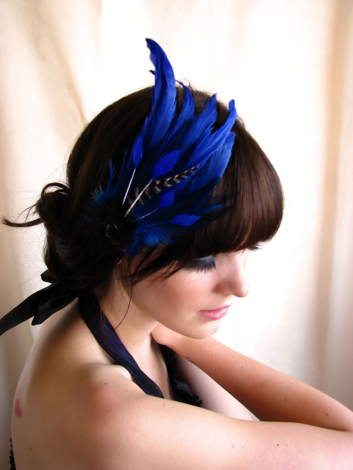 feather headdress facinator with striped feather coque and crystal