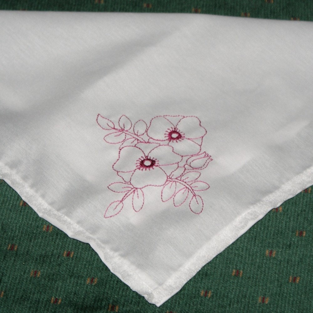 Hankie embroidered with flowers and edged with lace
