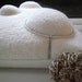 touch... this felted merinowool cushion/white