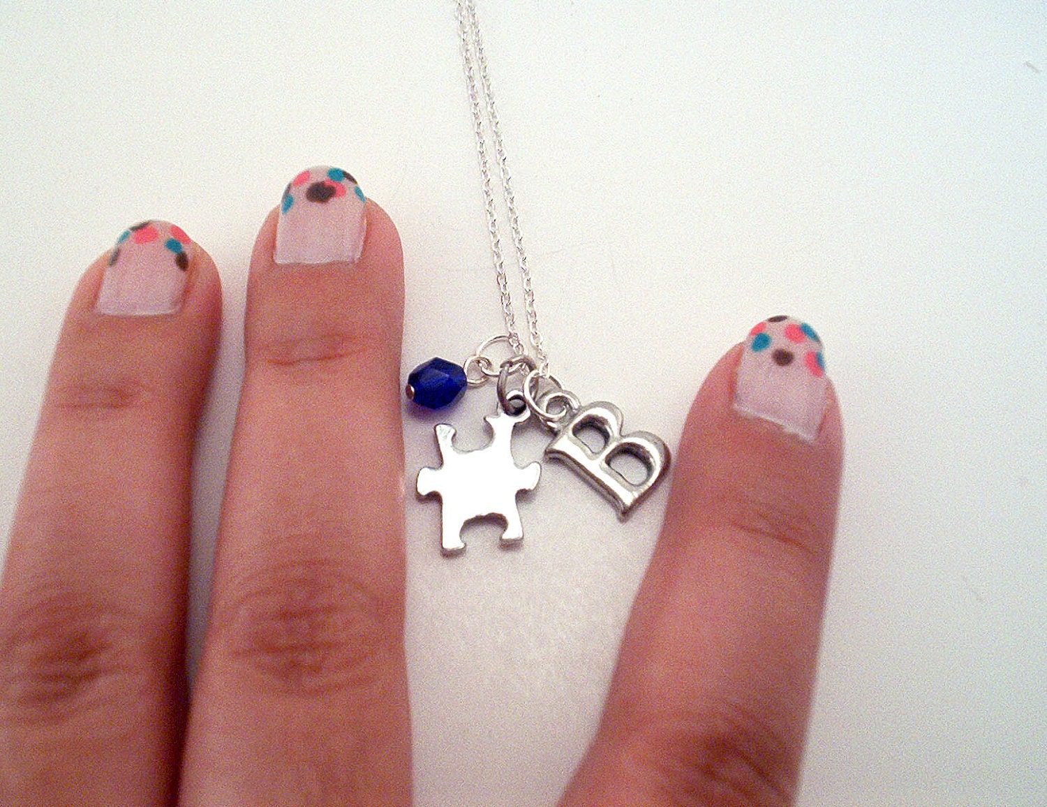 Puzzle piece best friend necklace. One puzzle necklace with custom initial and glass bead. Silver pewter puzzle piece, Czech glass bead.