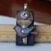 The Key - recycled DOMINO art pendant