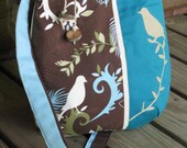Bird Enchantment shoulder bag in blue and brown with adjustable strap