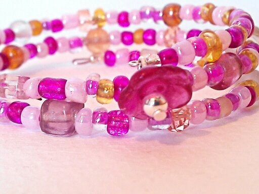 RESERVED....Pink purple and golds memory wire bracelet with charm
