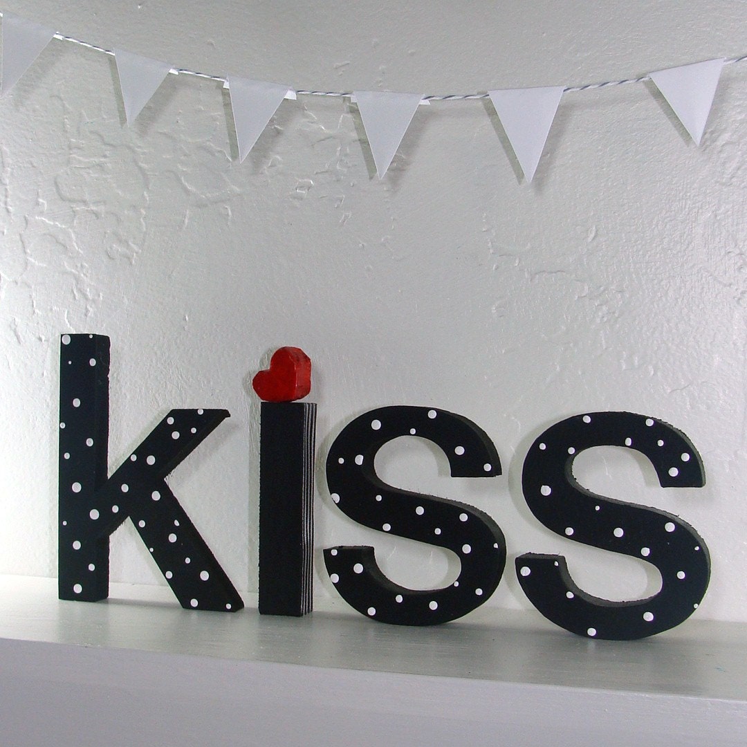 black and white kiss letters