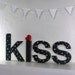black and white kiss letters