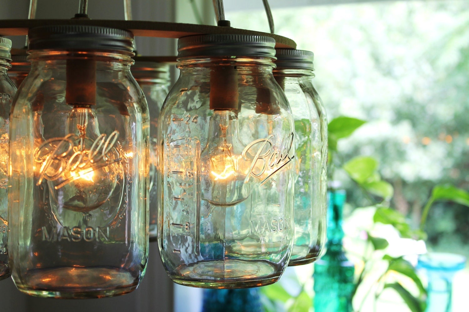 Beautifully rustic Mason Jar chandelier - featured on Momcaster.