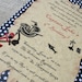 swashbuckling pirate birthday party invitation in black and red with antiqued treasure map