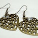 white swaroski crystal Antiqued brass heart earrings