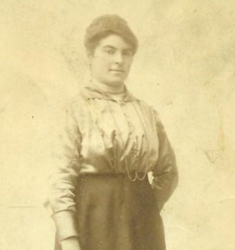 Practical Woman Flower Bouquet Antique RPPC Studio Portrait Photograph Standing Skirt Blouse Buckle Boots Necklace Photo