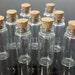50 Glass Bottles Vials with Corks... 2ml...Slight green tint