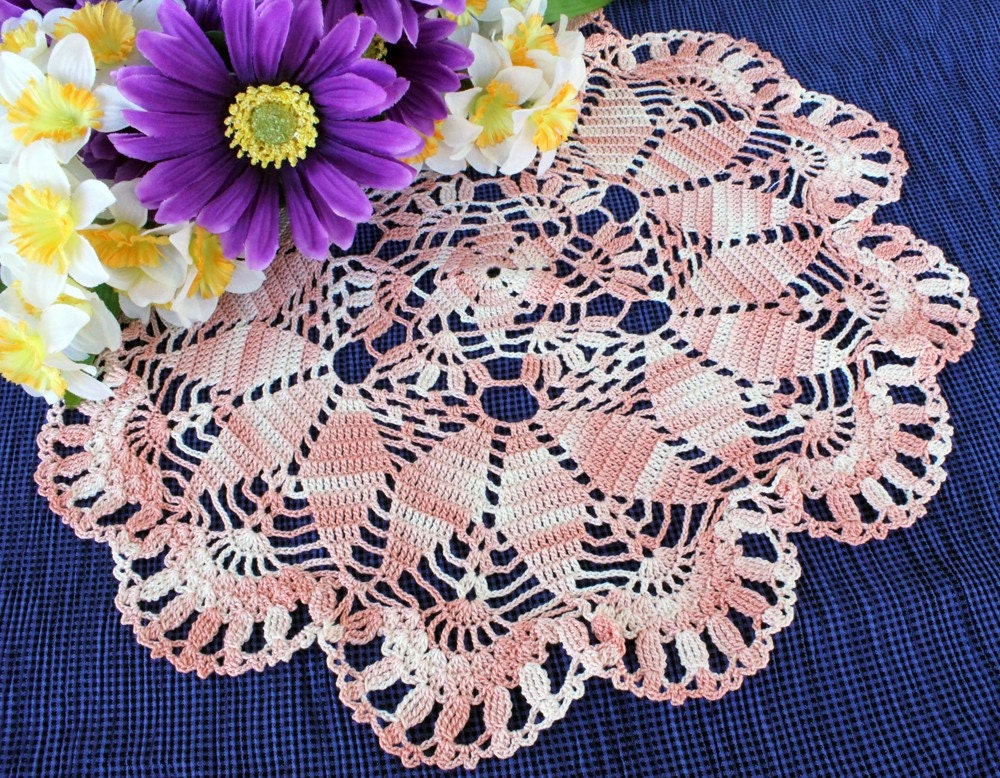 Pink and white crochet doily