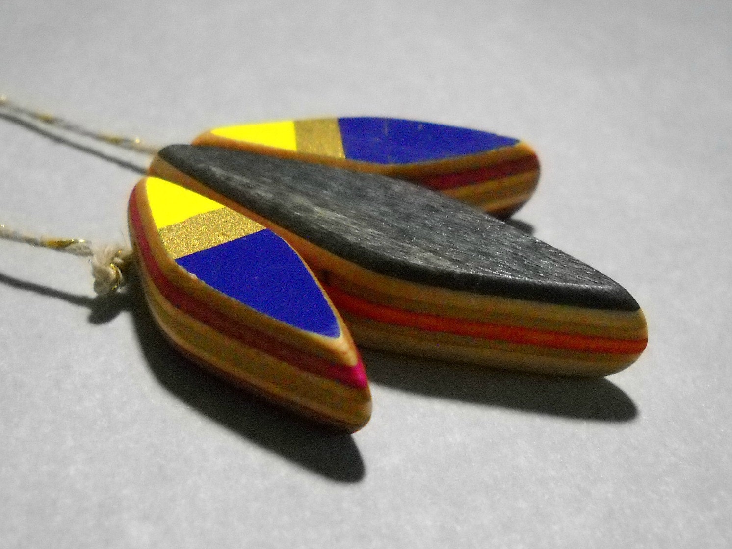 reversible recycled skateboard beaded necklace