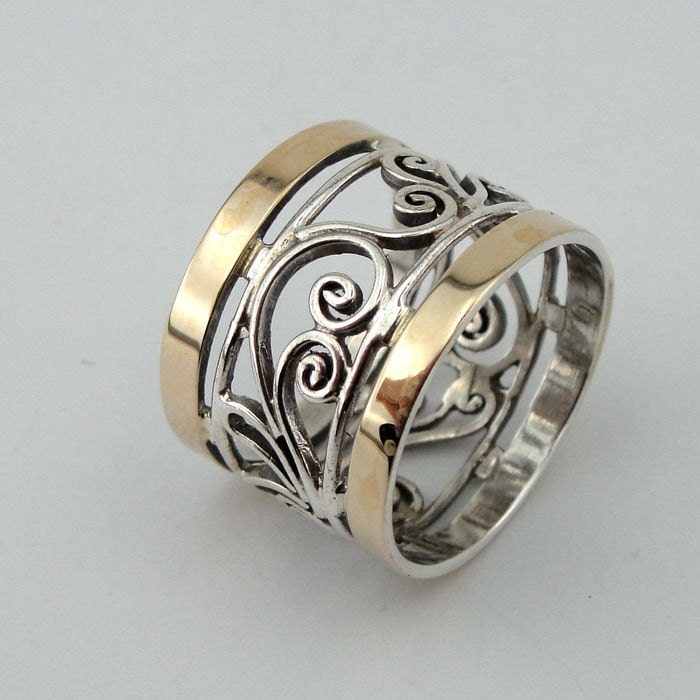 Great Sterling silver integrated 9K yellow gold  band size 7