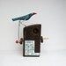 Small pecking bird